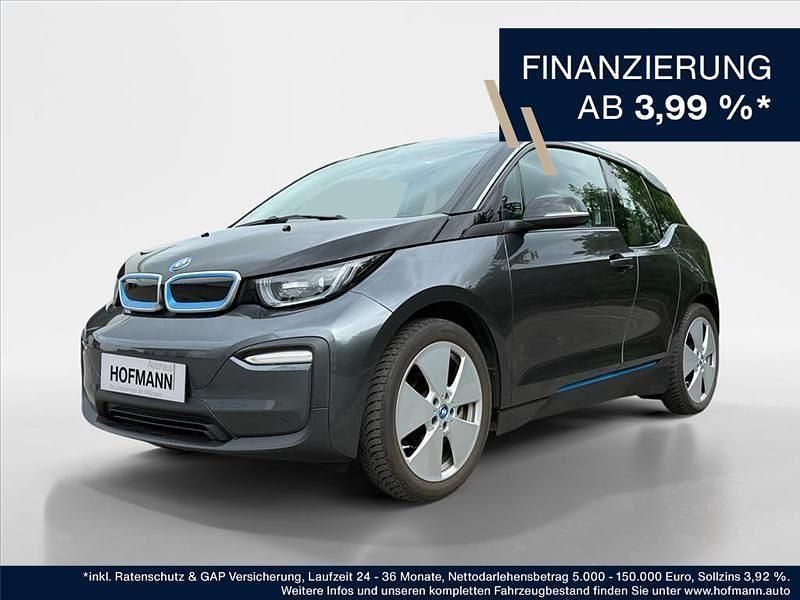 Grau Gebraucht 2021 BMW i3 Comfort Edition Kleinwagen | 20.929 € (Fairer Preis) - Bild 1/3
