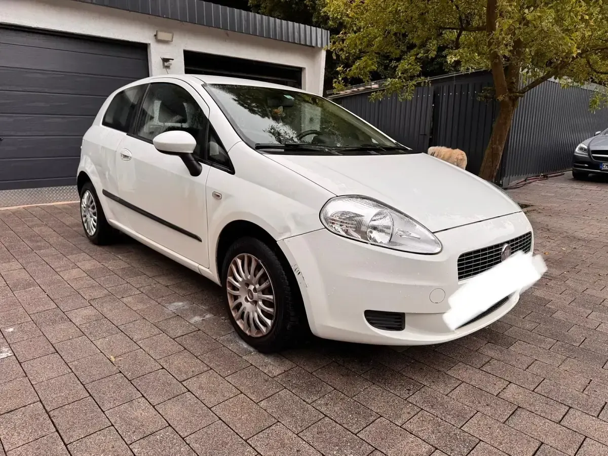Gebraucht Fiat Grande Punto 77 PS (56 kW) 2009 Weiß Kleinwagen