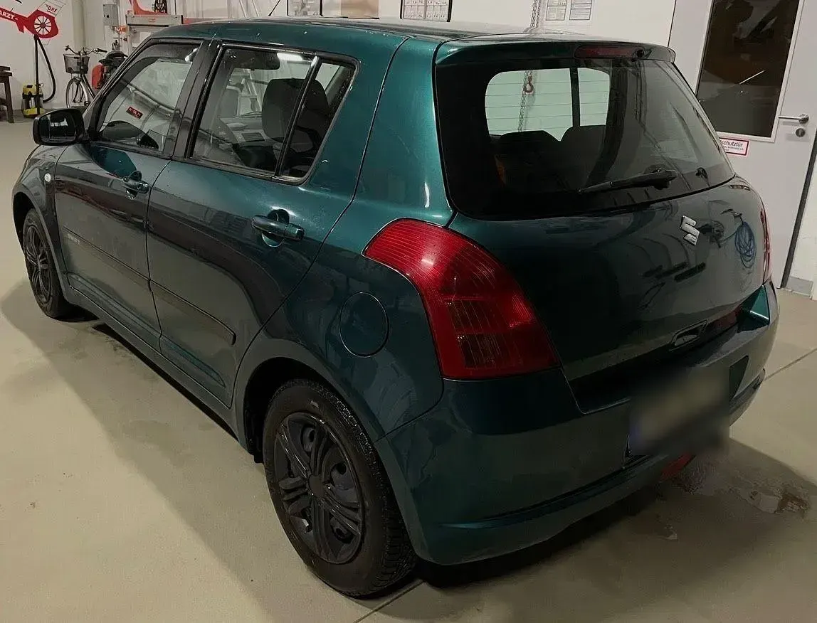 Używany Suzuki Swift 92 KM (67 kW) 2006 Zielony Hatchback