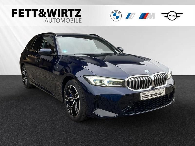 Bmw individual tansanitblau metallic Gebraucht 2024 BMW 330e M Sport Kombi | 49.888 € (Teuer) - Bild 1/3