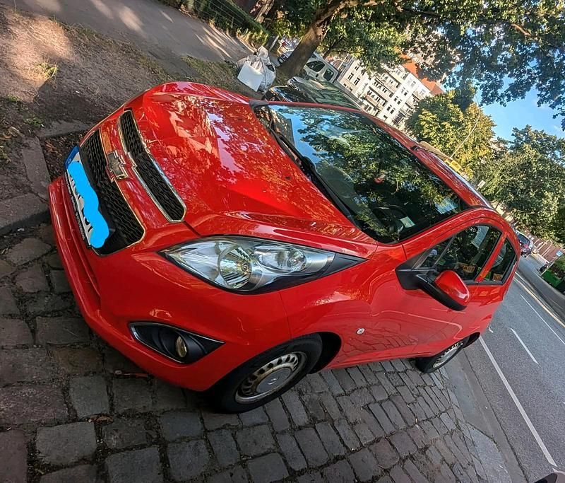 Rot Gebraucht 2013 Chevrolet Spark Kleinwagen | 1.200 € (Superpreis) - Bild 1/4