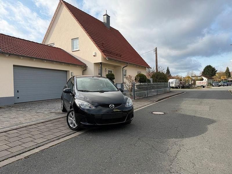 Schwarz Gebraucht 2009 Mazda 2 Limousine | 3.889 € (Fairer Preis) - Bild 1/4