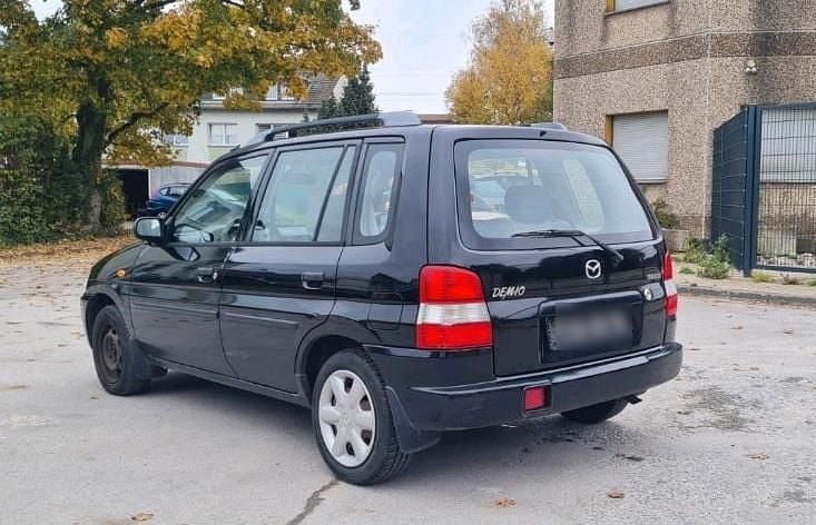Schwarz Gebraucht 2000 Mazda Demio Limousine | 1.400 € (Superpreis) - Bild 1/4