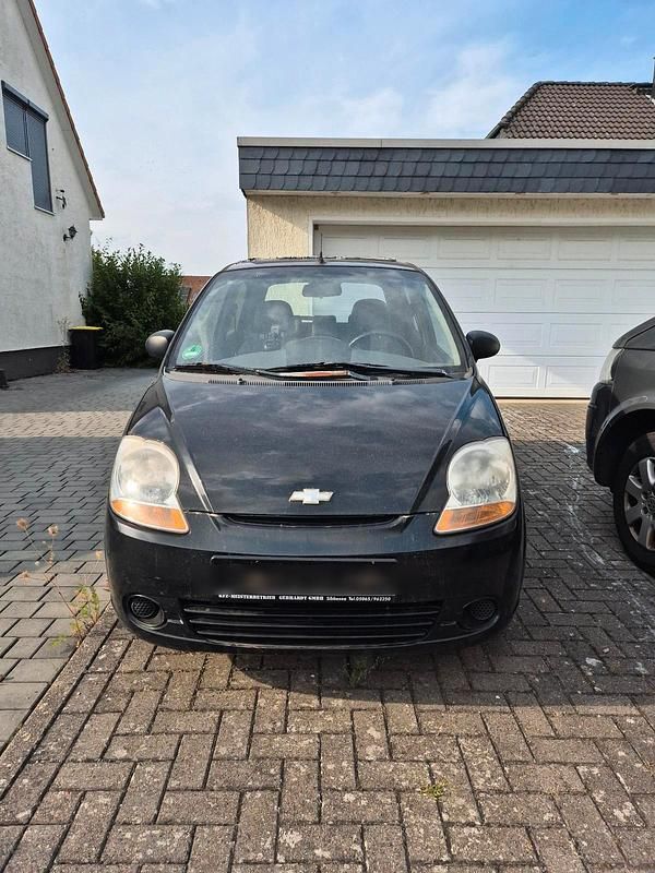 Schwarz Gebraucht 2006 Chevrolet Matiz Kleinwagen | 750 € - Bild 1/4