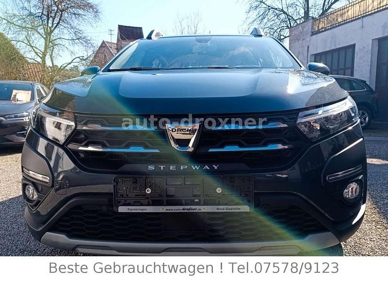Grau "comete" Gebraucht 2021 Dacia Sandero Comfort Kleinwagen | 13.990 € (Fairer Preis) - Bild 1/4