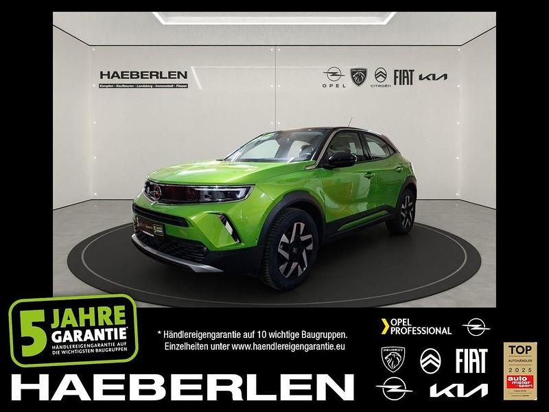 Lackierung matcha green/typ aussenverkle (metallic) Gebraucht 2023 Opel Mokka Elegance SUV | 17.390 € (Guter Preis) - Bild 1/4