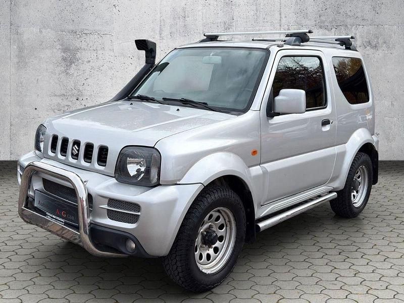 Silber Gebraucht 2009 Suzuki Jimny SUV | 10.900 € (Fairer Preis) - Bild 1/4