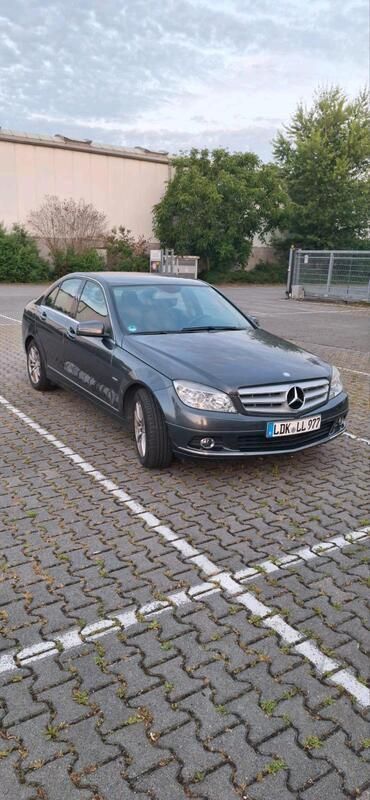 Grau Gebraucht 2010 Mercedes C180 Limousine | 11.000 € - Bild 1/4