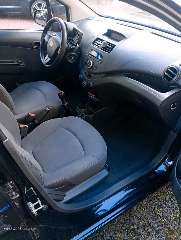 Second-hand Chevrolet Spark 68 CP (50 kW) 2012 Negru Hatchback