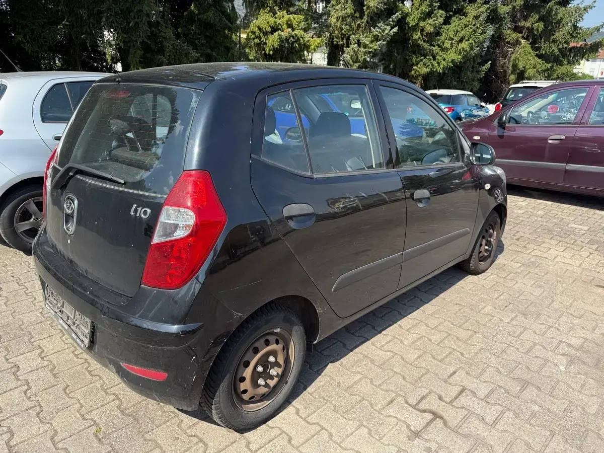Gebraucht Hyundai i10 69 PS (50 kW) 2013 Schwarz Kleinwagen
