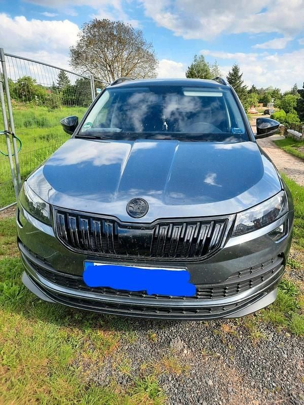 Grau Gebraucht 2019 Skoda Karoq SportLine SUV | 16.500 € (Superpreis) - Bild 1/4