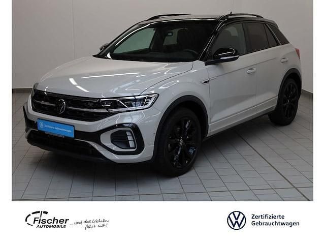Ascotgrau / dach deep black pe Gebraucht 2024 VW T-Roc R-line SUV | 36.480 € (Teuer) - Bild 1/3
