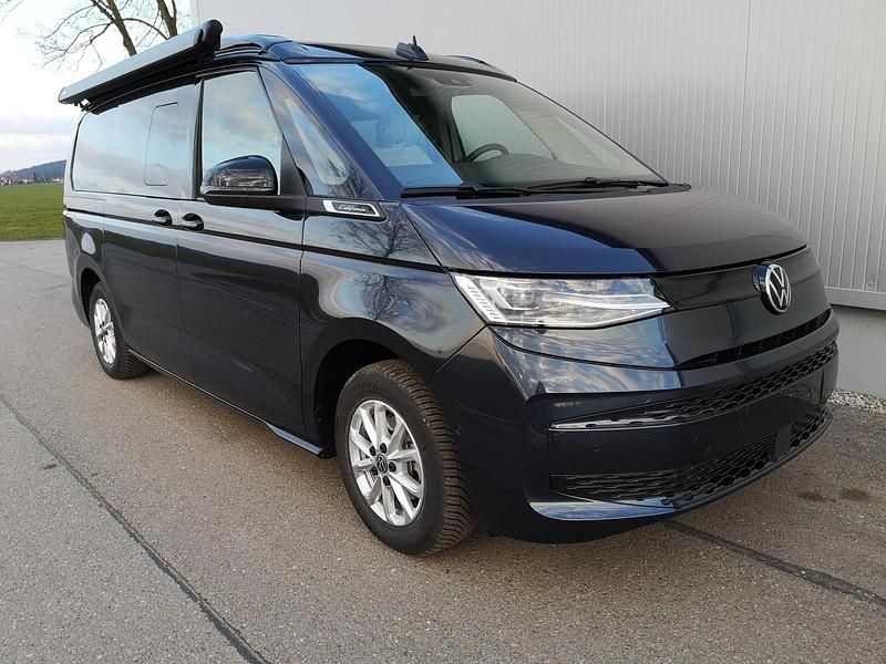 Gebraucht VW T7 Comfortline 150 PS (110 kW) 2024 Copperbronze metallic dach schwarz Van