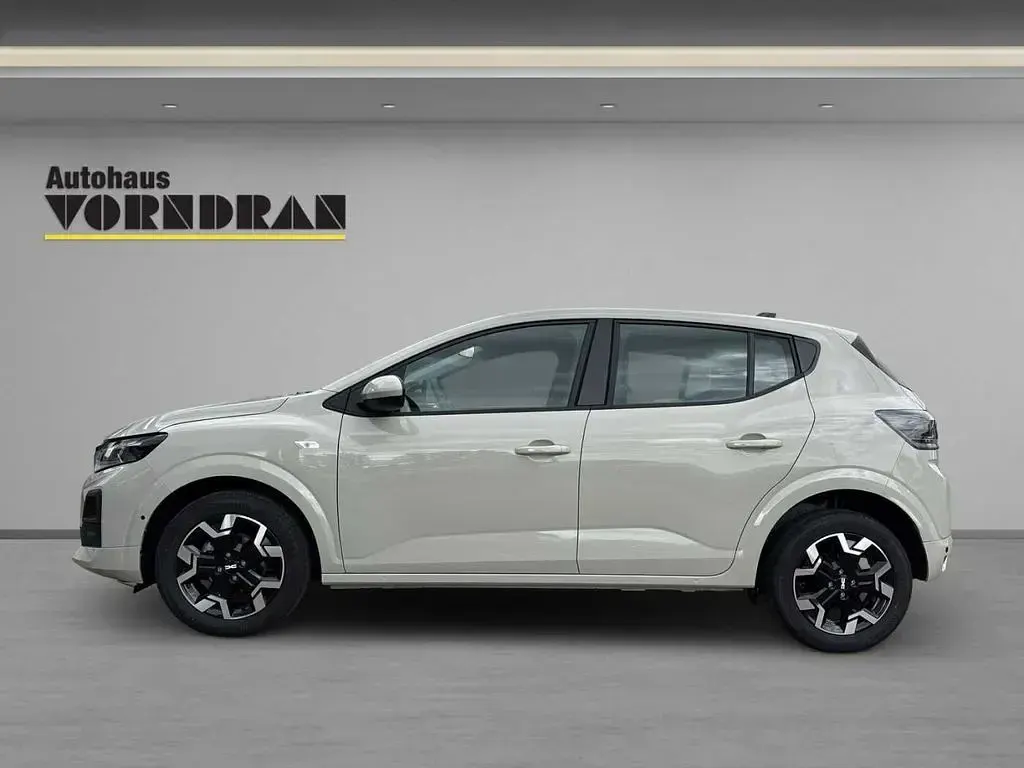 Neu Dacia Sandero Journey 101 PS (74 kW) 2025 Sandstone metallic Limousine