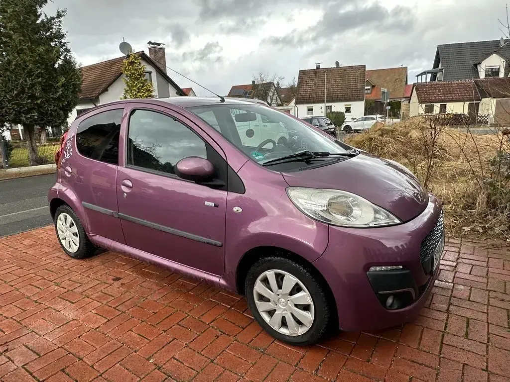 Gebraucht Peugeot 107 Style 68 PS (50 kW) 2014 Violet Kleinwagen