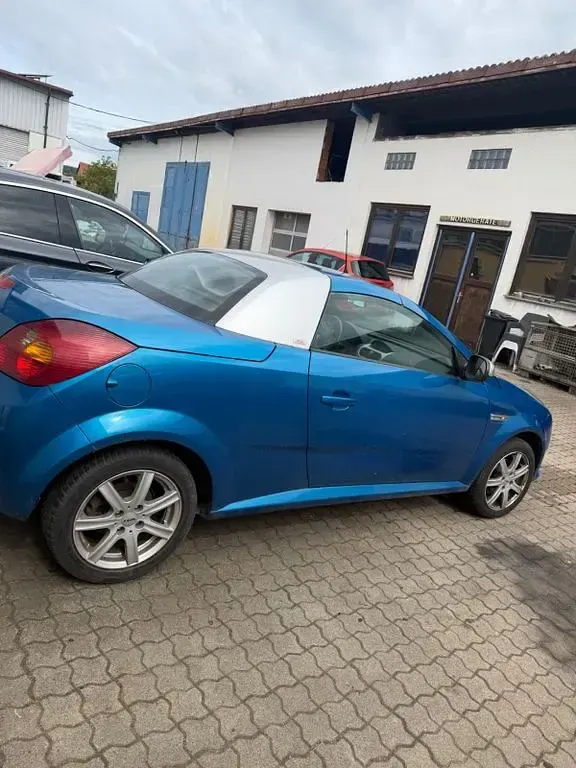 Używany Opel Tigra Cosmo 90 KM (66 kW) 2004 Niebieski Kabriolet