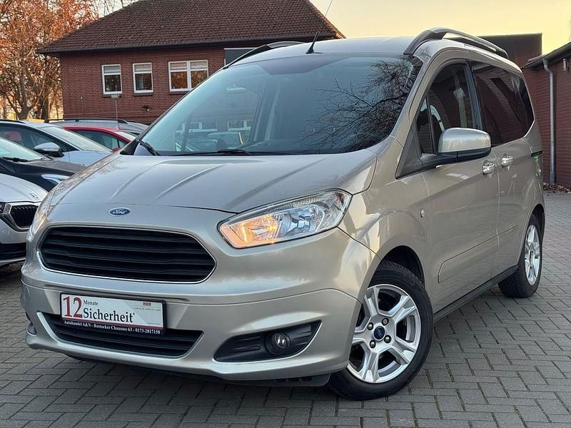 Silber Gebraucht 2014 Ford Tourneo Courier Trend Van / Kleinbus | 7.999 € (Fairer Preis) - Bild 1/4