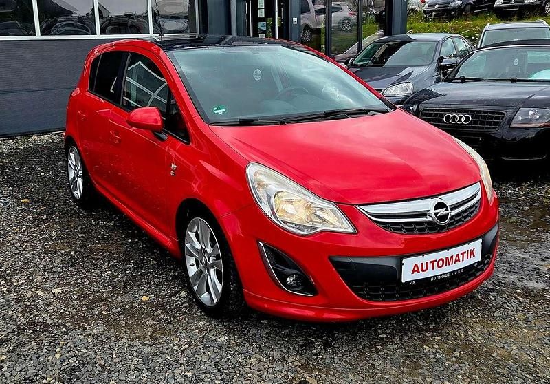 Gebraucht Opel Corsa 101 PS (74 kW) 2012 Magmarot/flame red Kleinwagen