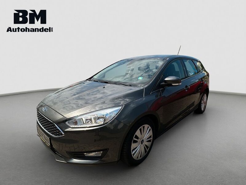 Grau Gebraucht 2016 Ford Focus Kombi | 7.990 € (Fairer Preis) - Bild 1/4
