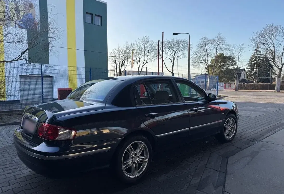 Gebraucht Kia Opirus 203 PS (149 kW) 2006 Blau Limousine