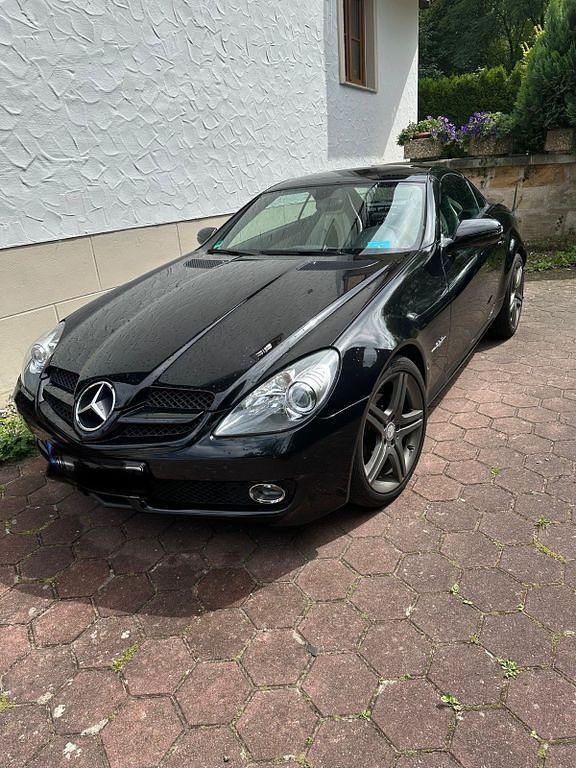 Schwarz Gebraucht 2010 Mercedes SLK200 2LOOK Edition Cabrio | 17.900 € (Teuer) - Bild 1/4