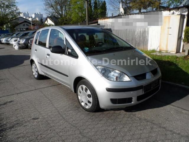 Gebraucht Mitsubishi Colt 95 PS (69 kW) 2004 Silber metallic Limousine