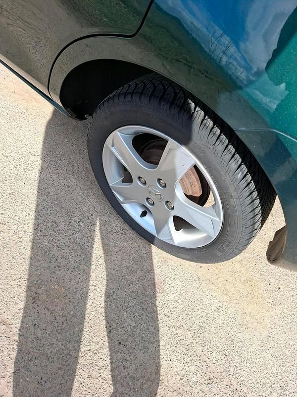 Second-hand Mazda 2 80 CP (58 kW) 2005 Verde Hatchback