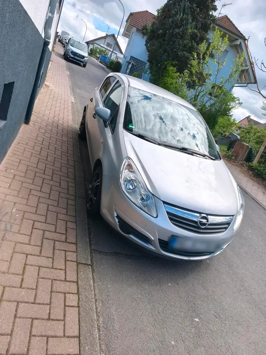Gebraucht Opel Corsa 80 PS (58 kW) 2009 Silber Kleinwagen