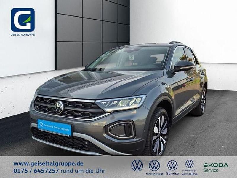 Indiumgrau Gebraucht 2024 VW T-Roc Life SUV | 28.760 € (Fairer Preis) - Bild 1/4