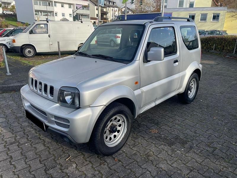 Silber Gebraucht 2011 Suzuki Jimny SUV | 8.499 € (Fairer Preis) - Bild 1/4