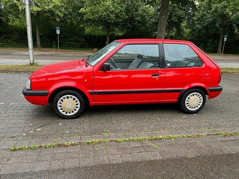 Rot Gebraucht 1991 Nissan Micra Kleinwagen | 3.999 € - Bild 1/4