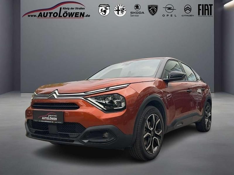 Karamellbraun/metal Gebraucht 2022 Citroën e-C4 Feel Limousine | 14.730 € (Superpreis) - Bild 1/4