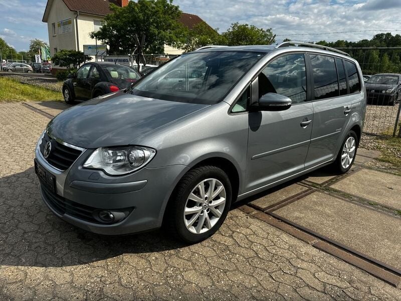 Grau Gebraucht 2010 VW Touran Freestyle Van / Kleinbus | 4.999 € (Superpreis) - Bild 1/4