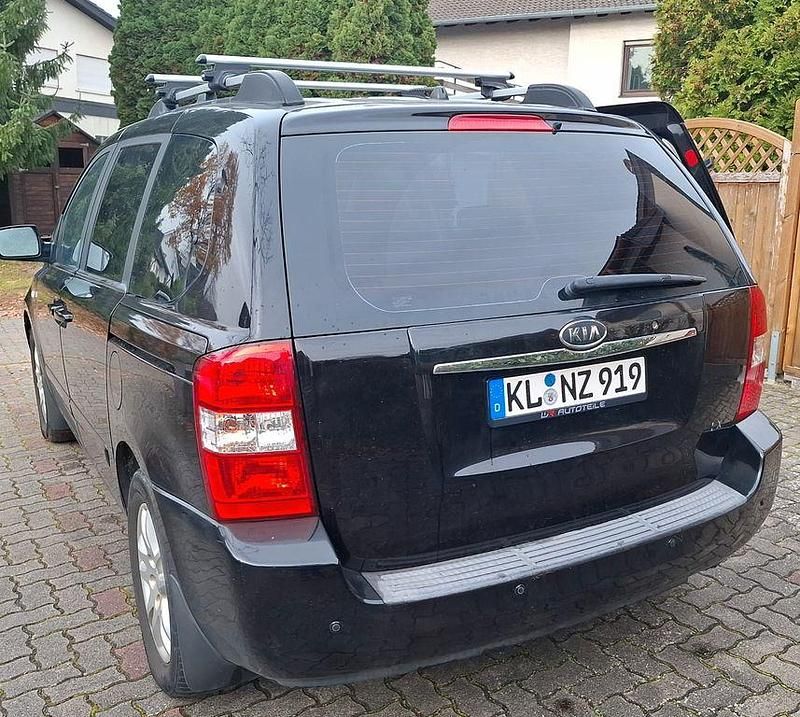 Schwarz Gebraucht 2009 Kia Carnival Basis Van / Kleinbus | 3.100 € (Fairer Preis) - Bild 1/4