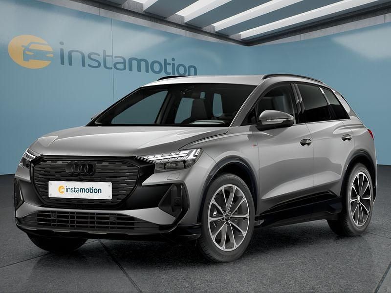 Grau Gebraucht 2024 Audi Q4 e-tron SUV | 43.399 € (Etwas zu teuer) - Bild 1/4