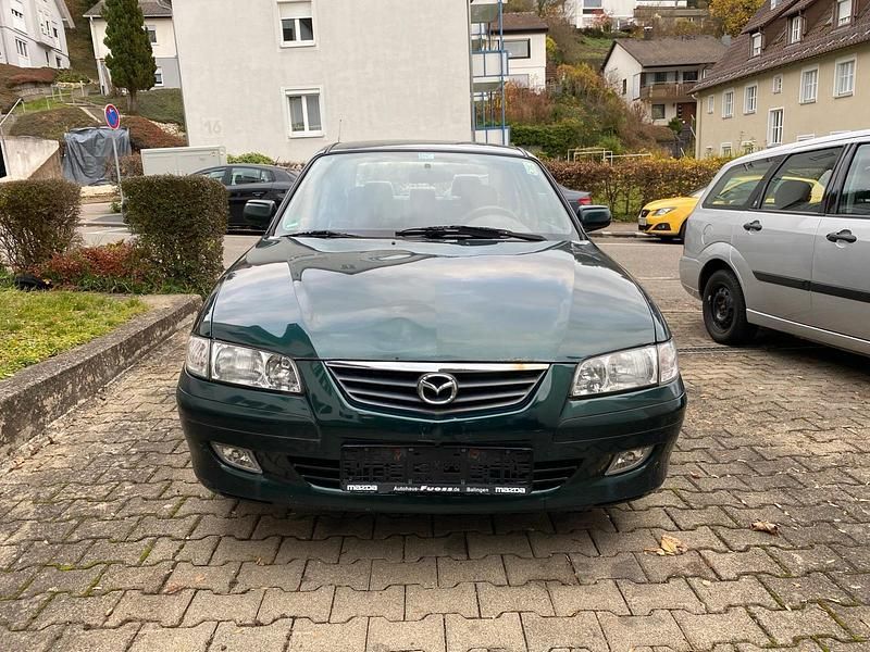 Grün Gebraucht 2000 Mazda 626 Limousine | 600 € - Bild 1/4