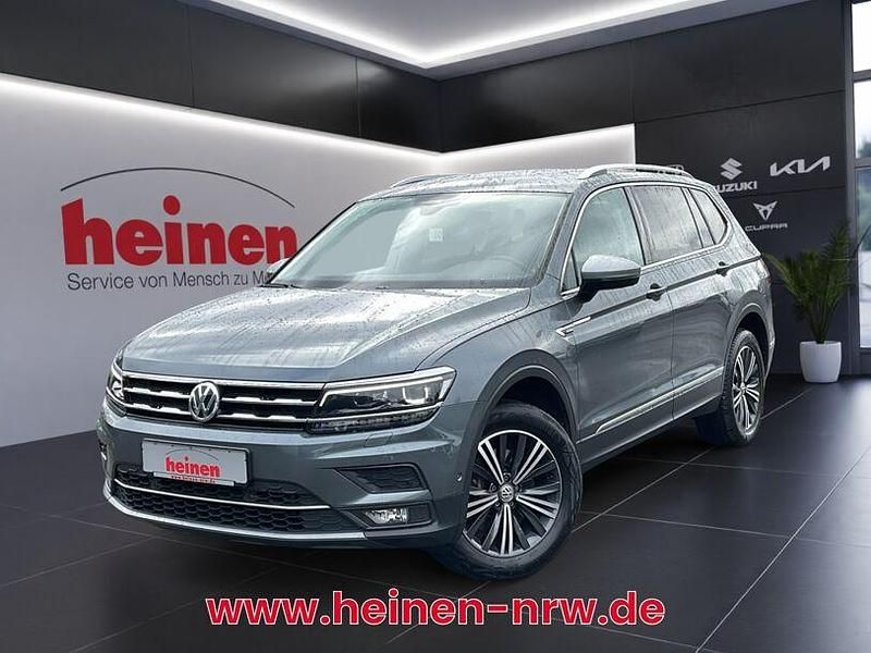 Grau Gebraucht 2021 VW Tiguan Allspace Highline SUV | 31.399 € (Superpreis) - Bild 1/4