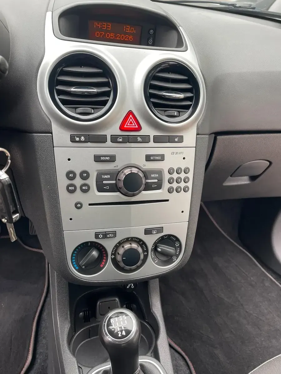Gebraucht Opel Corsa 70 PS (51 kW) 2012 Grau Kleinwagen