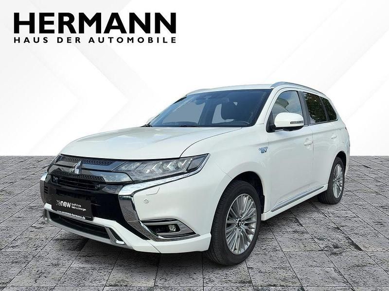 Weiß Gebraucht 2018 Mitsubishi Outlander P-HEV Top SUV | 19.799 € (Fairer Preis) - Bild 1/4