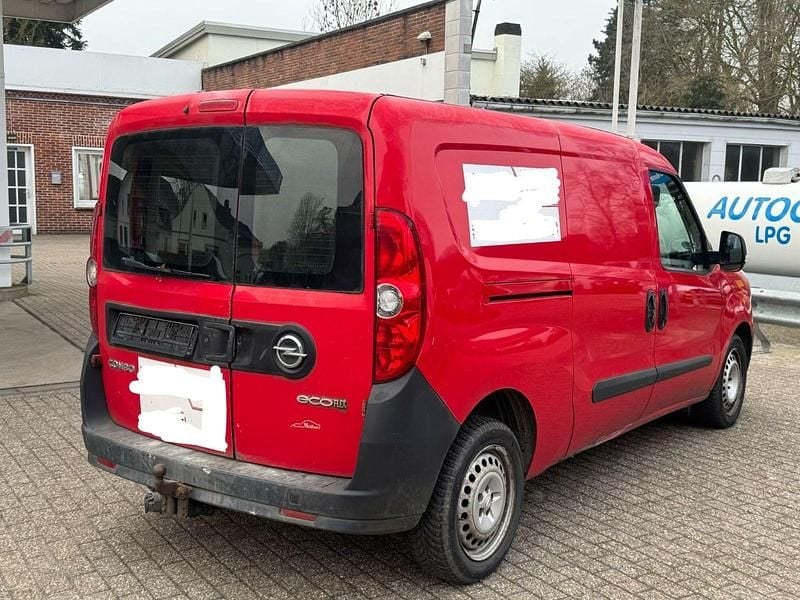 Second-hand Opel Combo 90 CP (66 kW) 2013 Roșu Monovolum