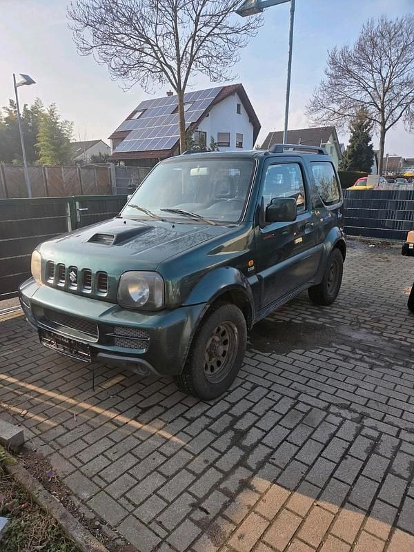 Grün Gebraucht 2006 Suzuki Jimny SUV | 3.200 € (Superpreis) - Bild 1/4