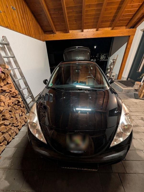 Gebraucht Peugeot 206 60 PS (44 kW) 2011 Schwarz Limousine