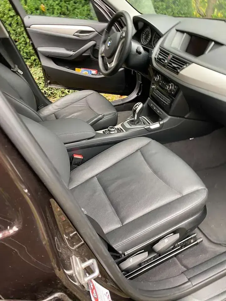 Używany BMW X1 184 KM (135 kW) 2014 Brązowy SUV