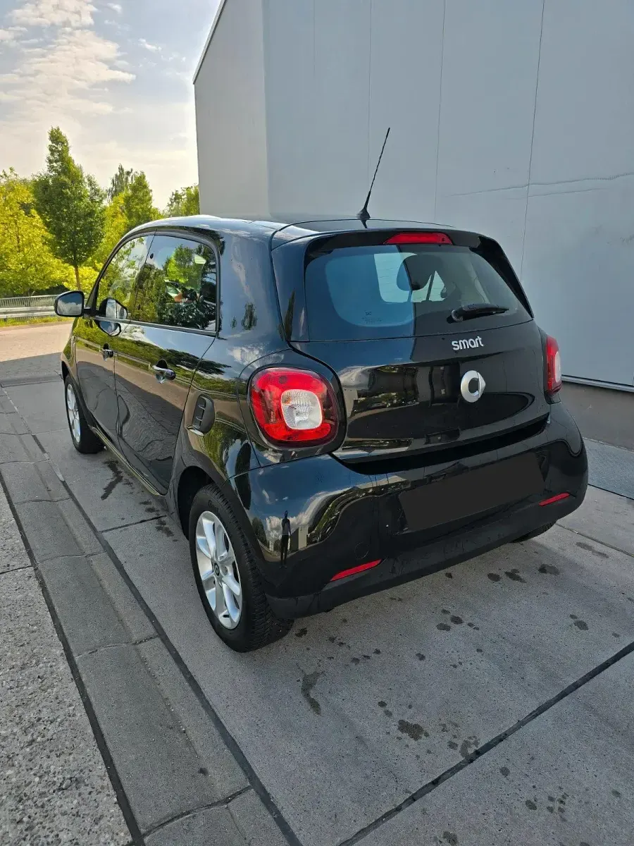 Gebraucht Smart ForFour Passion 71 PS (52 kW) 2015 Schwarz Kleinwagen