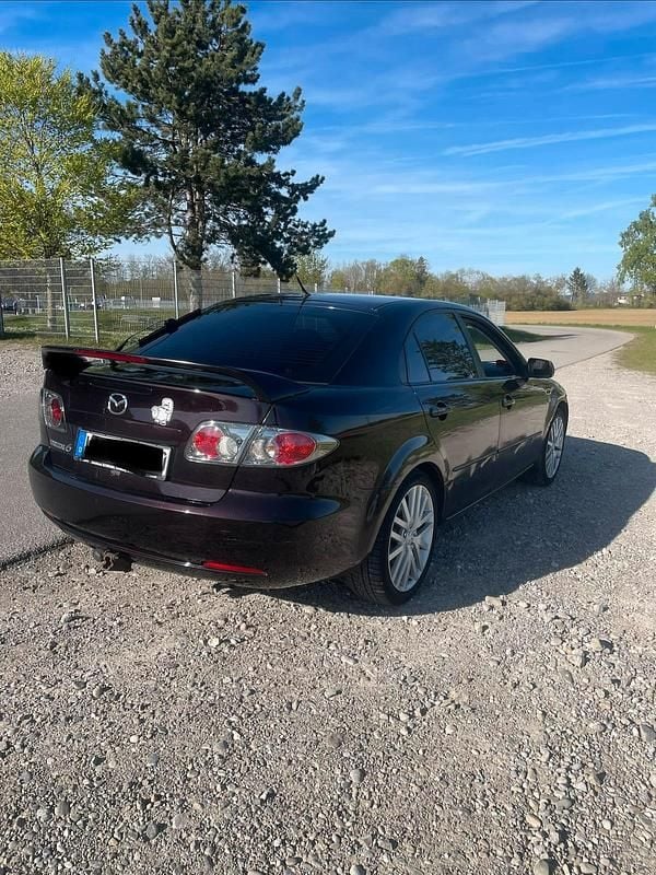 Używany Mazda 6 147 KM (108 kW) 2006 Purpurowy Sedan/Limuzyna