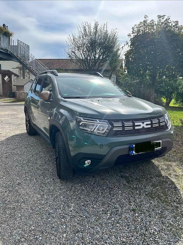 Grau Gebraucht 2024 Dacia Duster Extreme SUV | 21.500 € (Superpreis) - Bild 1/4