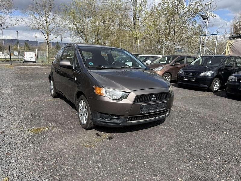 Gebraucht Mitsubishi Colt 95 PS (69 kW) 2011 Granitbraun (m) Kleinwagen