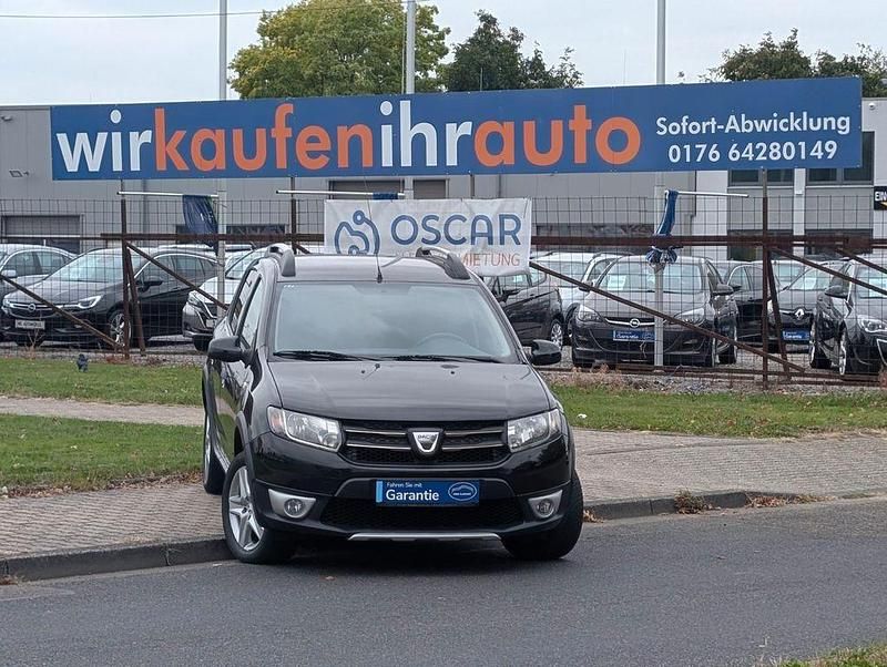 Schwarz Gebraucht 2014 Dacia Sandero Prestige Kleinwagen | 6.499 € (Fairer Preis) - Bild 1/4