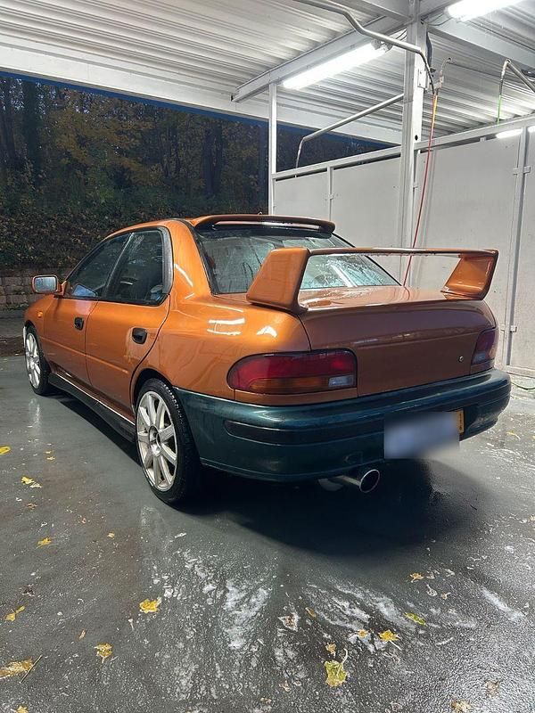 Gebraucht Subaru Impreza GT 125 PS (91 kW) 1996 Orange Limousine