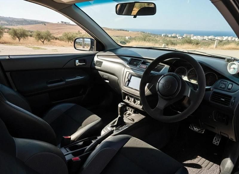 Gebraucht Mitsubishi Lancer 330 PS (242 kW) 2006 Schwarz Kombi